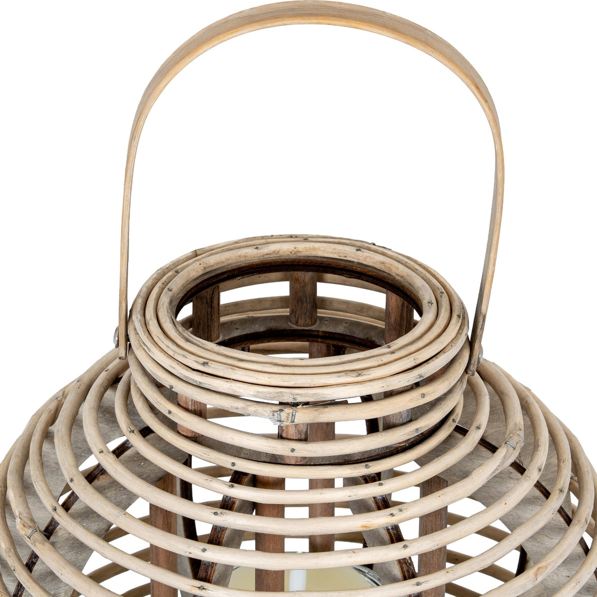 Close-up of Hill Interiors Large Round Willow Lantern in brown, showing the woven wicker dome, arched handle and removable glass candle holder inside.