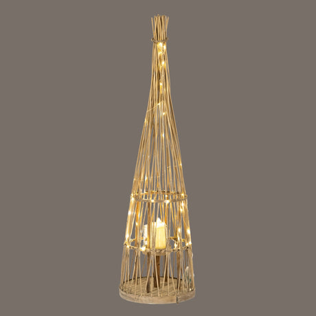 Hill Interiors small conical wicker lantern in brown with tapered woven frame, illuminated fairy lights and a lit pillar candle in a glass holder.