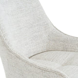 Close-up of the Hill Interiors Vaxeer Dining Chair in white, showing the curved backrest and contoured seat in a soft woven-look upholstery finish.
