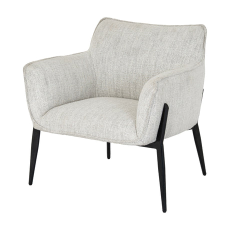 Hill Interiors Vaxeer Accent Chair in light neutral upholstery with sloped arms, curved backrest and slim black metal legs on a white background.