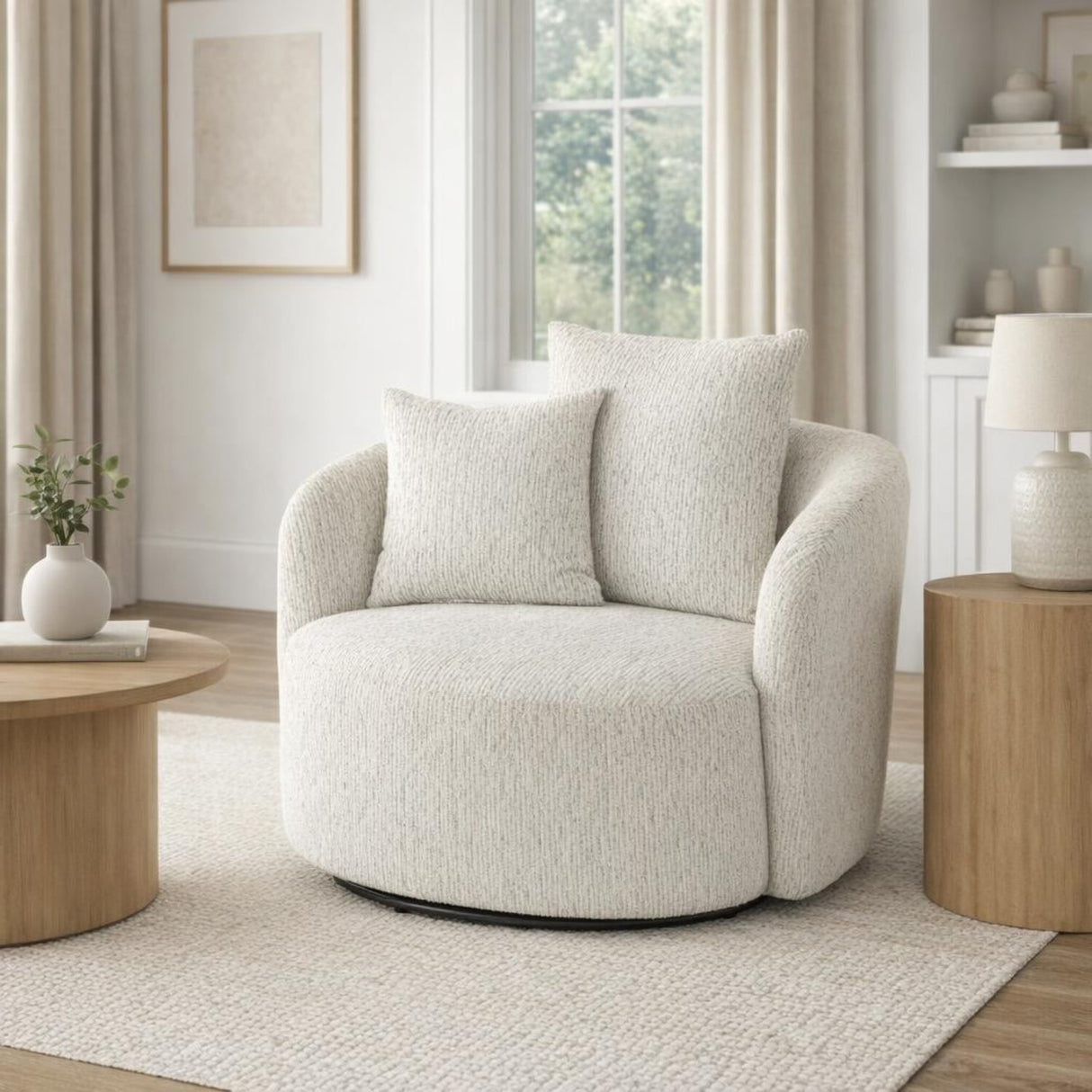 Marlenza Swivel Accent Chair in white textured upholstery with rounded arms and matching cushions, styled in a bright neutral living room by a window.