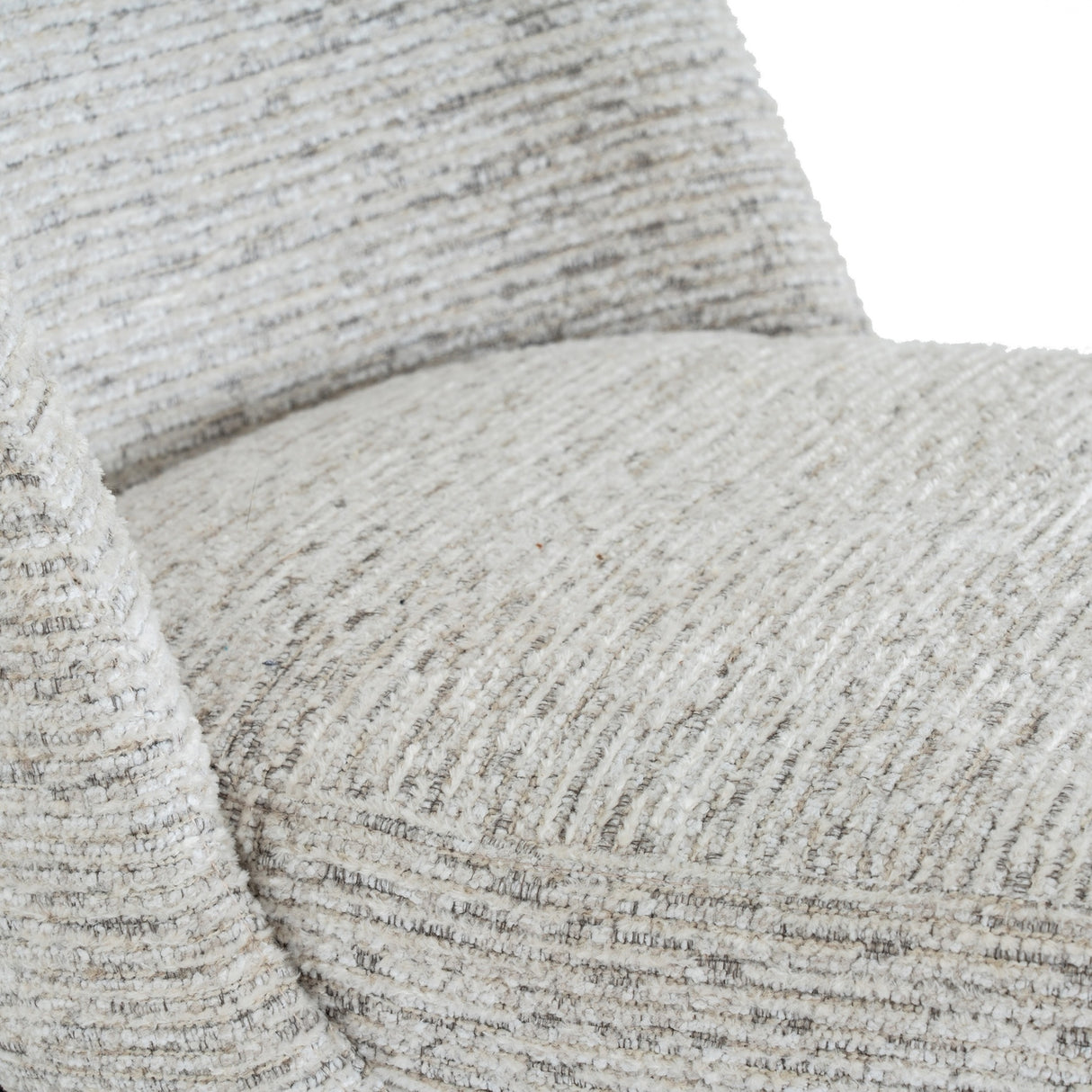 Close-up of the Hill Interiors Marlenza dining chair showing its soft white woven-textured upholstery across the curved backrest and seat.