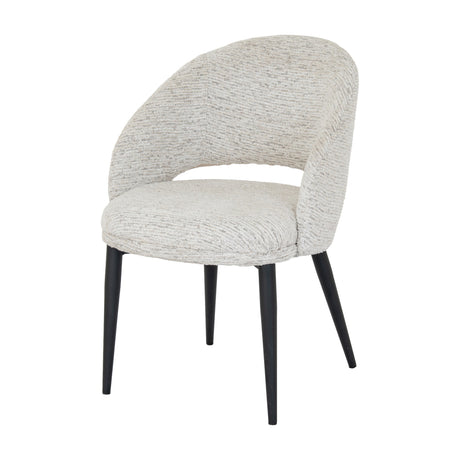 Hill Interiors Marlenza Curved Dining Chair in textured cream upholstery with a wraparound open back and tapered black metal legs, on a white background.