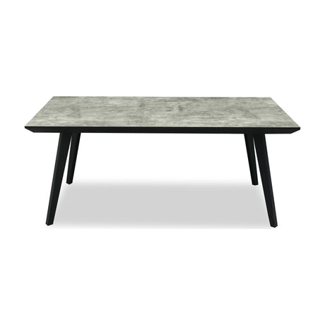 Hill Interiors rectangular dining table with a grey concrete-effect top and angled matte black metal legs, shown on a plain white background.