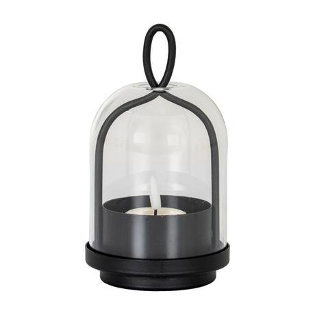 Hill Interiors large black candle holder with clear glass cloche and looped handle, holding a lit tealight, shown on a plain white background.