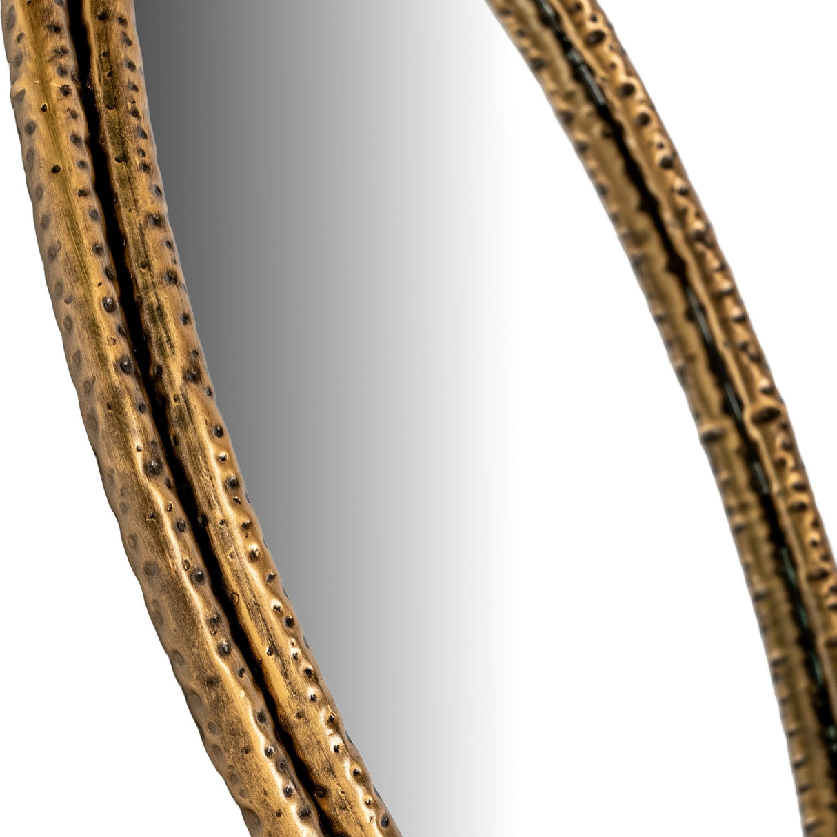 Close-up of the Hill Interiors Sillura large round wall mirror showing the dimpled, pebbled gold frame and clear glass against a white background.