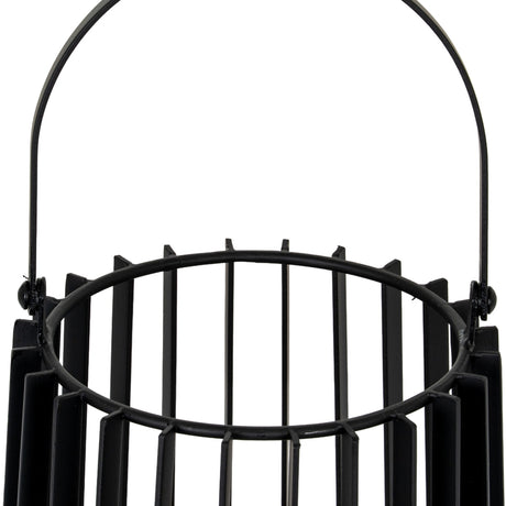 Close-up of Hill Interiors medium black metal lantern showing the vertical bar frame, rounded carry handle and interior glass candle holder.