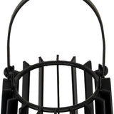 Close-up of the Hill Interiors small black metal lantern showing the arched carry handle and slatted top frame around the glass candle holder.
