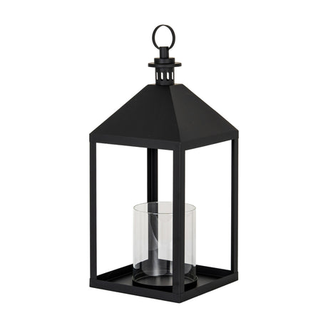 Hill Interiors large black metal lantern candle holder with pyramid roof, ring handle and clear glass pillar candle insert, shown on a white background.