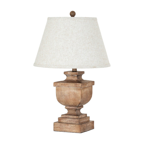 Hill Interiors Table Lamp with urn-shaped brown resin base and tapered edged linen shade, shown on a plain white background.