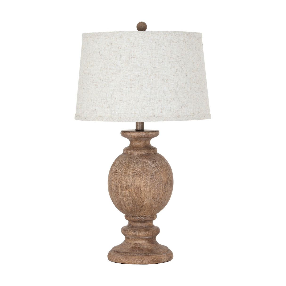 Hill Interiors table lamp with a sculpted brown resin baluster base and tapered edged linen shade, shown on a plain white background.