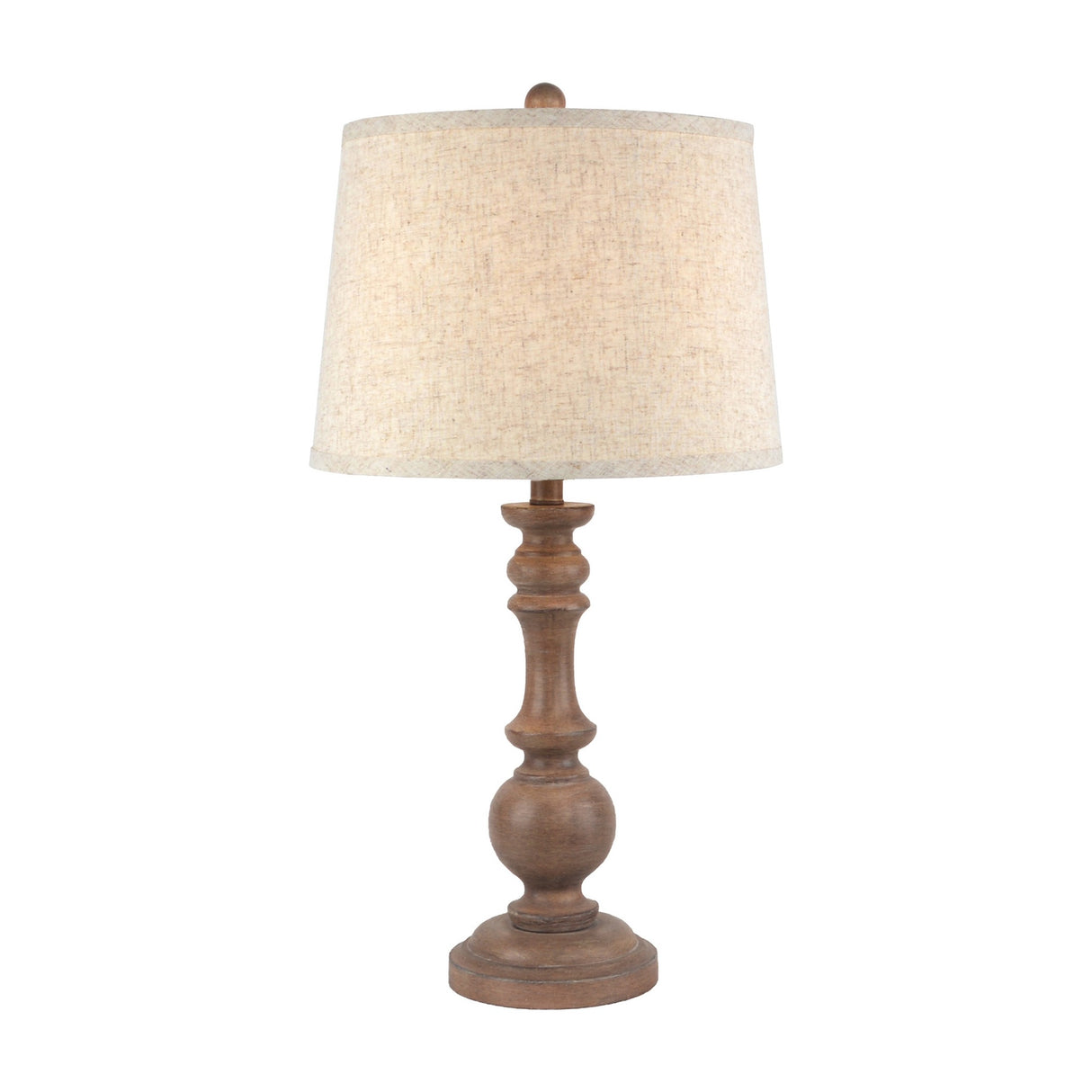 Hill Interiors Velantha table lamp with a sculptural turned brown resin base and edged linen drum shade, shown on a plain white background.