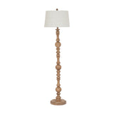 Hill Interiors Velantha floor lamp with turned brown resin baluster base and edged linen tapered shade, shown on a plain white background.