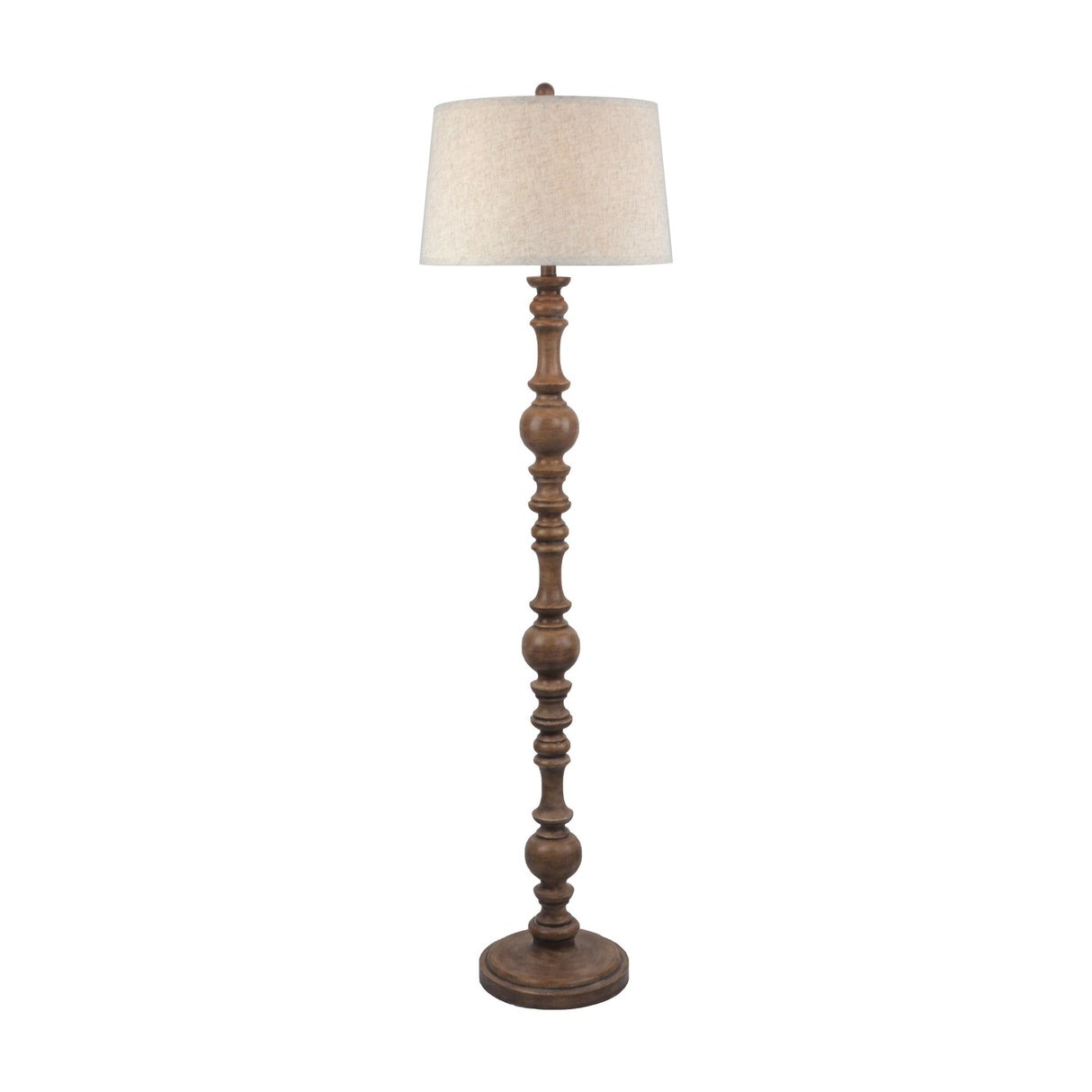 Hill Interiors Velantha floor lamp with turned brown resin baluster base and edged cream linen drum shade on a plain white background.