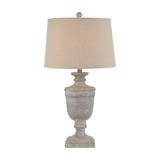 Hill Interiors Table Lamp with white moulded resin urn-shaped base and natural linen drum shade, shown on a plain white background.