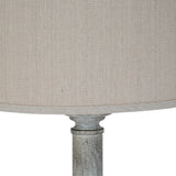 Close-up of Hill Interiors Floor Lamp with Linen Shade in white, showing the natural linen drum shade meeting the turned resin base.