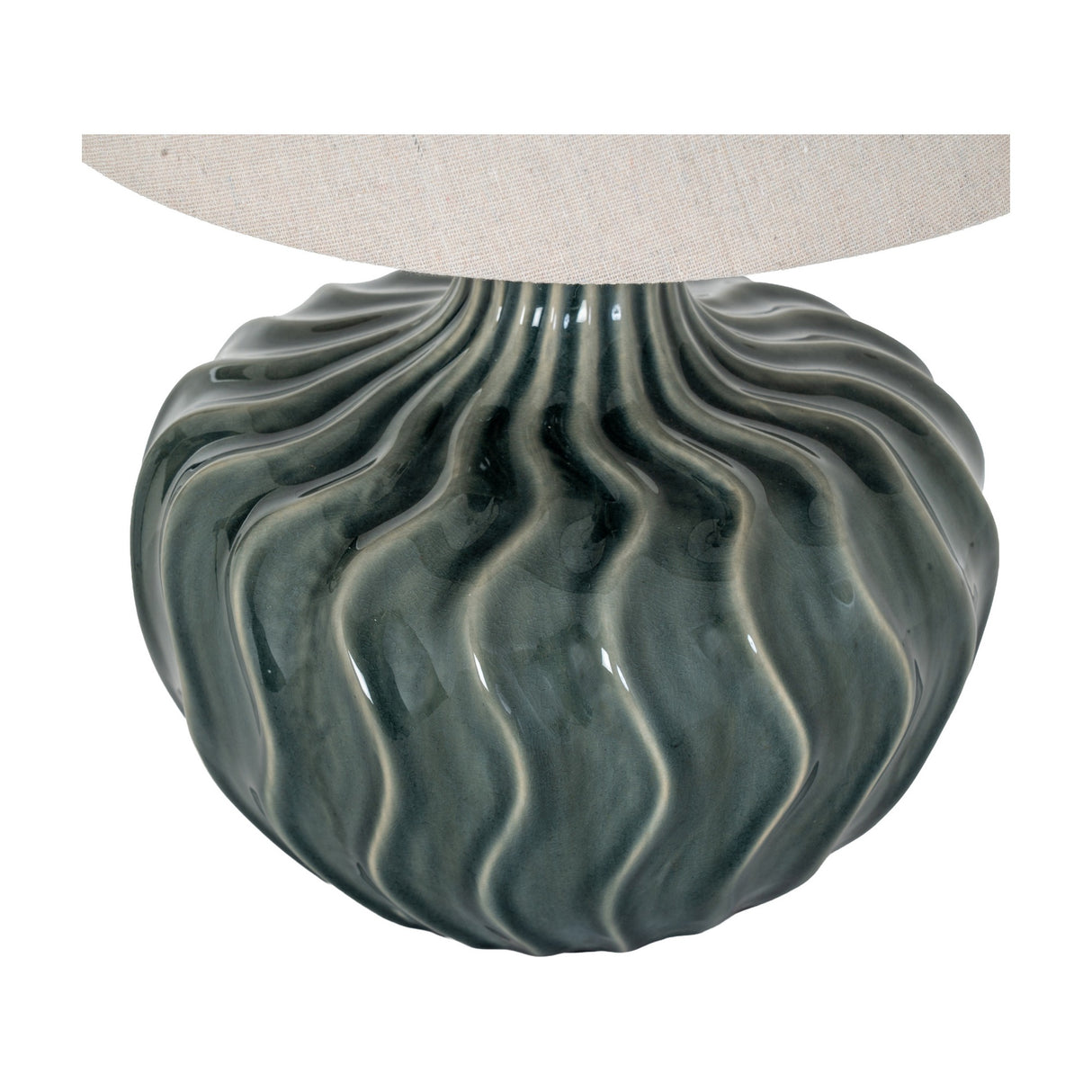 Hill Interiors ceramic table lamp base in glazed dark grey with a rippled wave texture, topped by a natural linen shade, on a plain background.