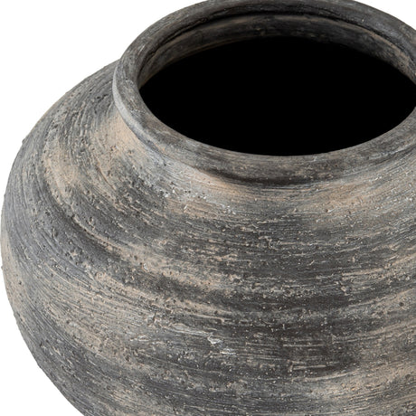 Close-up of Hill Interiors Squat Ceramic Vase in black, showing the rounded body, short neck and textured, weathered glaze against a plain background.