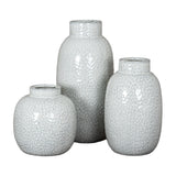 Hill Interiors Large Dimpled Ceramic Vase in white, shown grouped with two smaller dimpled vases of varying heights against a plain white background.