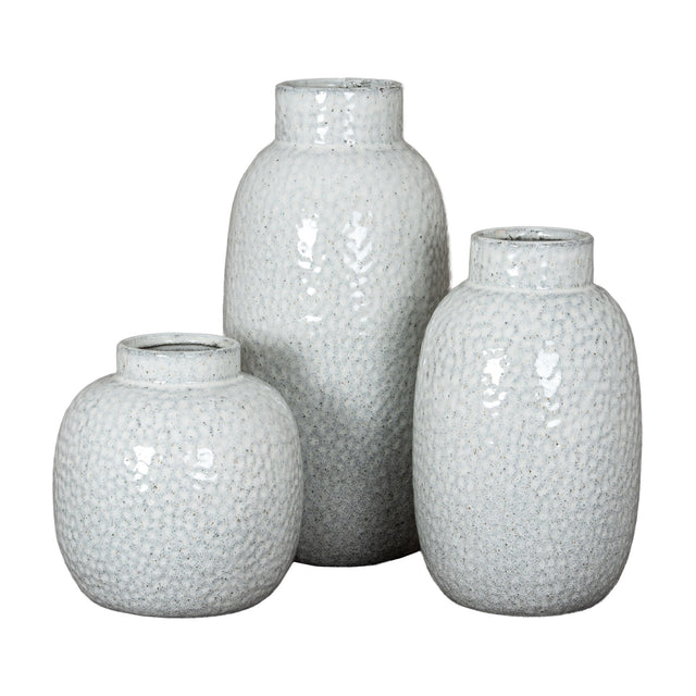 Hill Interiors Large Dimpled Ceramic Vase in white, shown grouped with two smaller dimpled vases of varying heights against a plain white background.