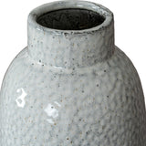Close-up of the Hill Interiors Large Dimpled Ceramic Vase in white, showing its narrow neck and speckled matt glaze with a softly dimpled surface.