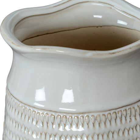 Close-up of the Hill Interiors Cylinder Hewn ceramic vase in white, showing the glossy wavy rim and carved teardrop texture on the body.