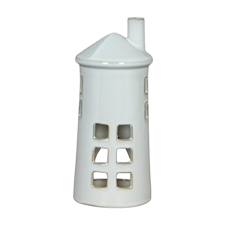 Hill Interiors Large Lighthouse Tealight Holder in white ceramic, with tapered tiered form, cut-out windows and slim chimney top, on a plain background.
