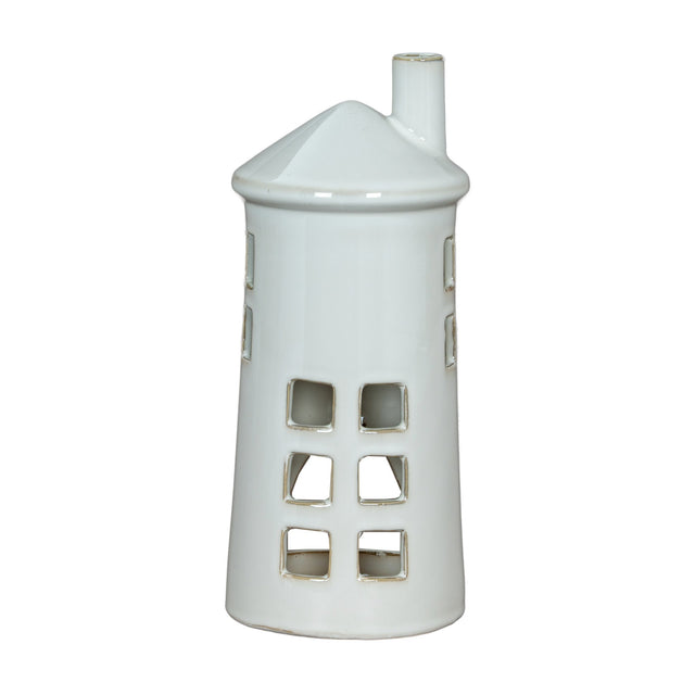 Hill Interiors Large Lighthouse Tealight Holder in white ceramic, with tapered tiered form, cut-out windows and slim chimney top, on a plain background.