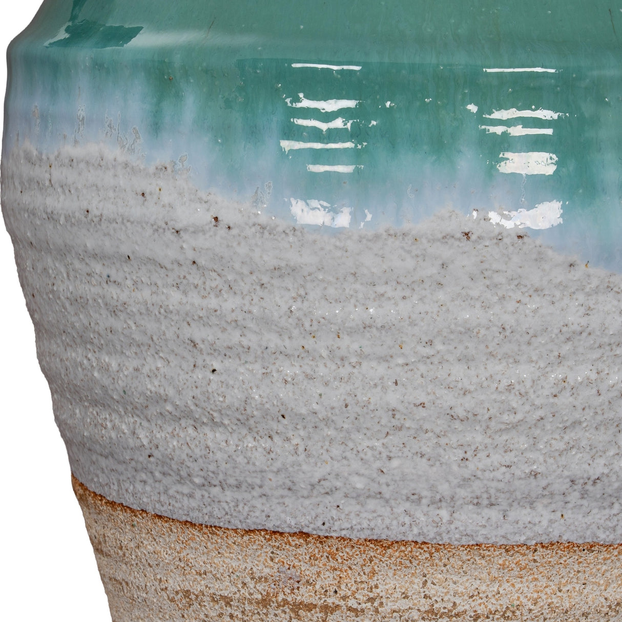 Close-up of Hill Interiors Ceramic Olpe Vase showing the glossy turquoise glaze dripping onto a textured white band above a natural sandy ceramic base.