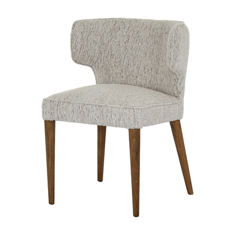 Hill Interiors Quennomer wooden dining chair with a curved wingback in textured grey upholstery and tapered wood legs, shown on a white background.