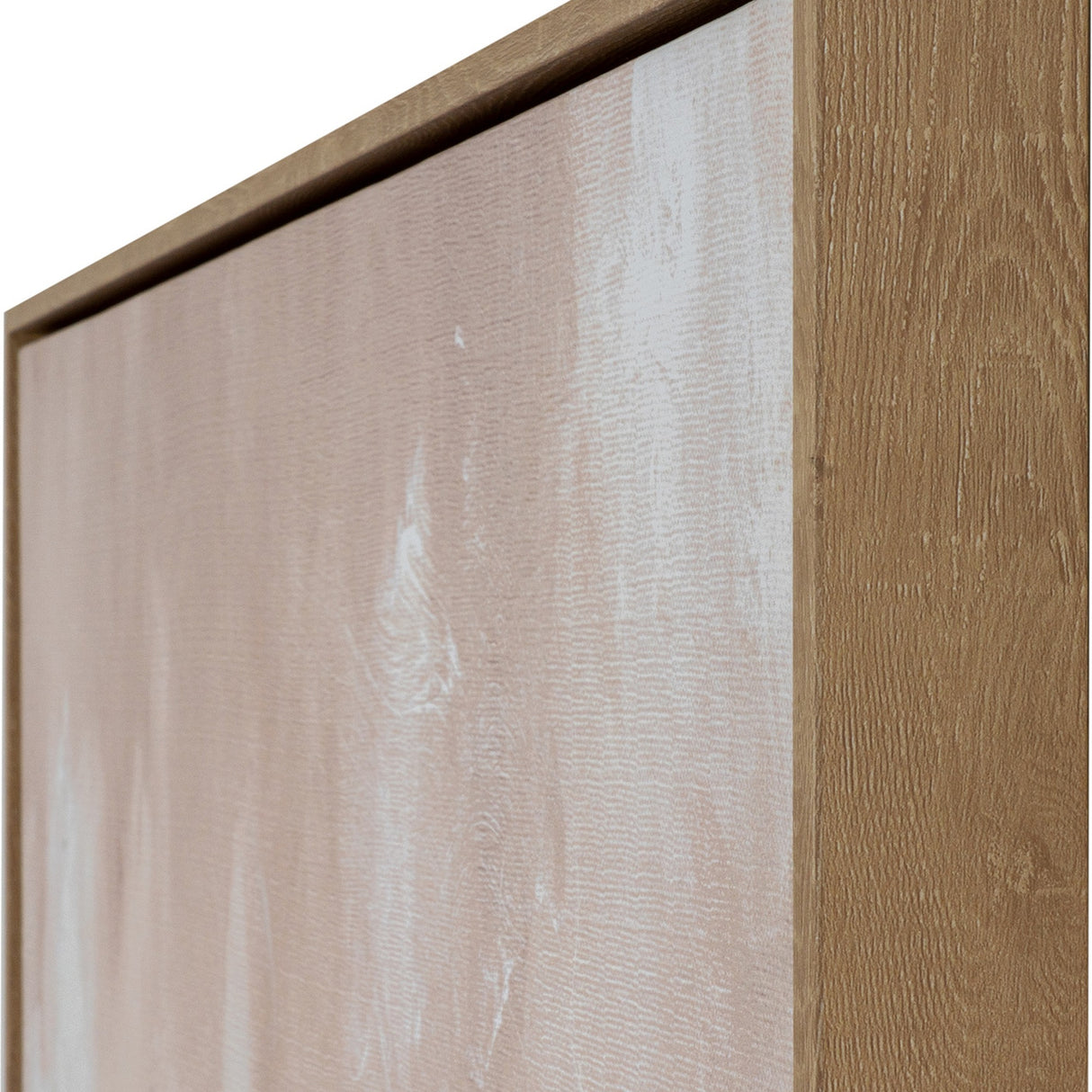 Close-up of the Hill Interiors hand painted canvas showing layered pale pink and cream brushwork within a slim wooden frame.