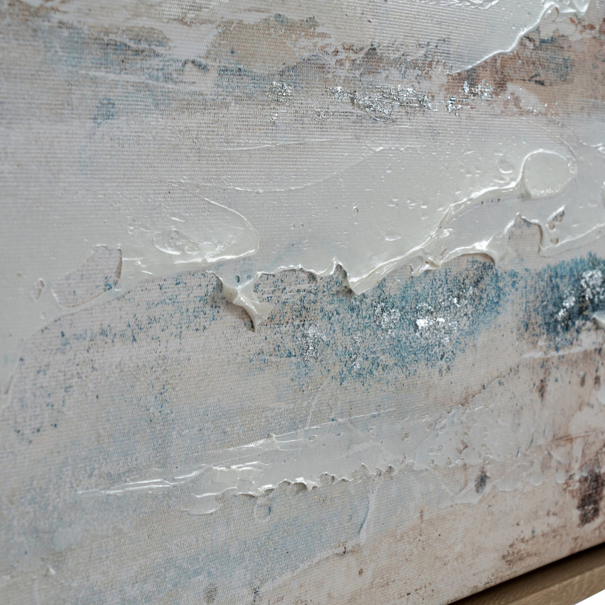 Close-up of Hill Interiors Hand Painted Canvas showing textured white, blue and beige brushwork with silver flecks on canvas weave.