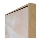 Close-up corner view of Hill Interiors hand painted canvas showing soft pink and cream brushwork within a slim light wooden frame.