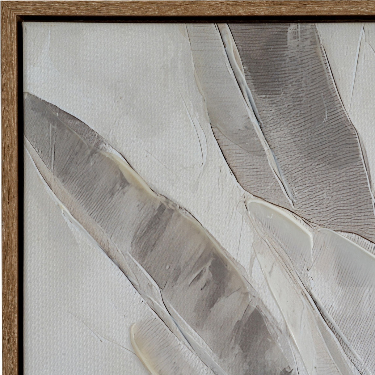 Close-up of Hill Interiors hand painted canvas wall art showing textured cream, grey and beige brushwork within a slim light wooden frame.