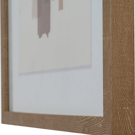 Close-up of the Hill Interiors framed wall art showing the solid wooden frame corner and part of the multicoloured painterly print inside.