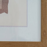 Close-up corner detail of the Hill Interiors Framed Terrain Print Wall Art showing the wooden frame and soft multicoloured overlapping tones of the print.