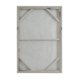 Reverse view of Hill Interiors Framed Terrain Print Wall Art showing the wooden stretcher frame, cross braces and two metal hanging hooks on a white background.