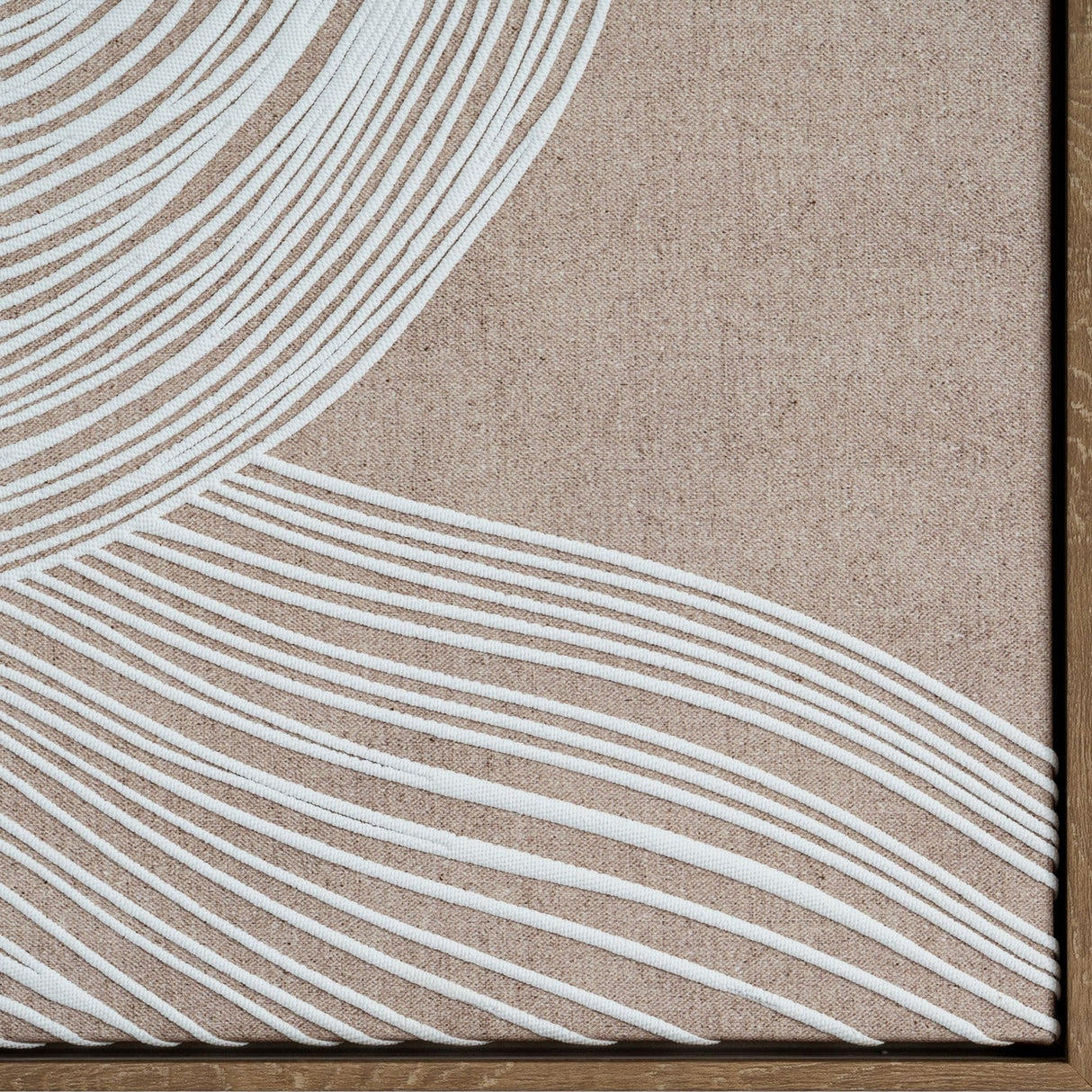Close-up of Hill Interiors Line Art Framed Wall Print in brown, showing white flowing lines on neutral linen-look background within a warm brown wooden frame.