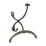 Hill Interiors Silver Metal Coat Hanger with a shaped scrolled frame, integrated hooks and aged silver finish, embossed Hotel de Paris detail, on white.