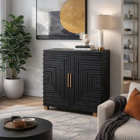 Hill Interiors Harweld two door small sideboard in matte black wood with geometric ridged doors and brass handles, styled in a bright living room.