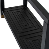Close-up of the Hill Interiors Harweld black console table showing the panelled lower shelf detail and black wooden frame supporting the glass top.