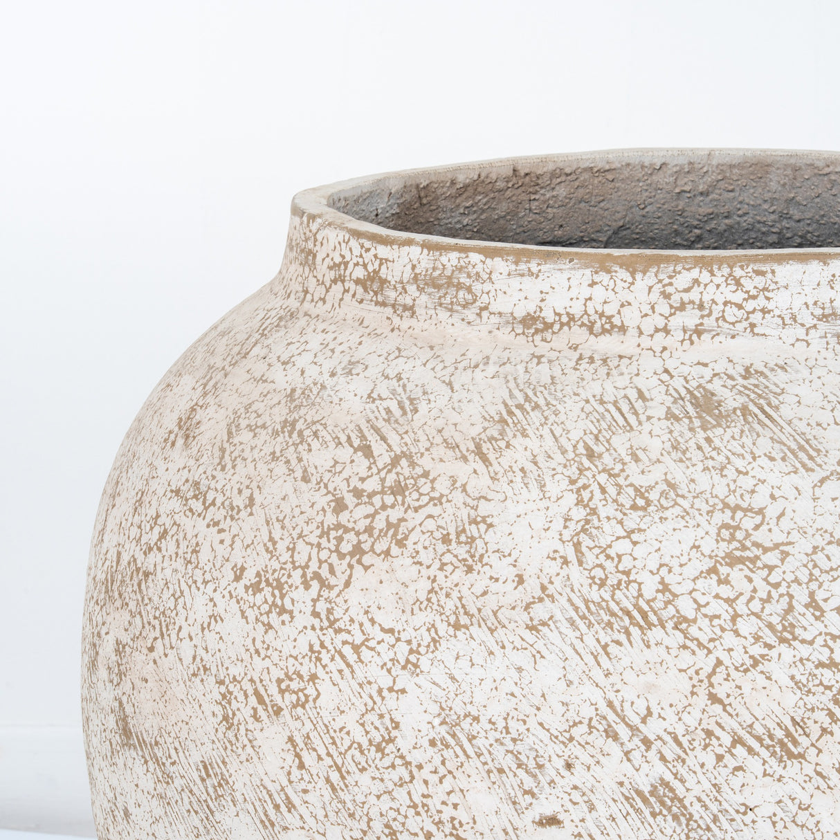 Hill Interiors Rustic Wash Concrete Planter with rounded vase form, weathered whitewashed finish over natural concrete, and wide opening on white background.