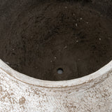 Close-up of Hill Interiors Rustic Wash Concrete Planter showing the weathered white-washed rim and textured dark grey interior with a drainage hole.