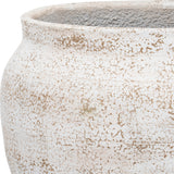 Close-up of Hill Interiors Rustic Wash Belly Planter showing the concrete body with mottled white and beige finish and subtle horizontal ridging.