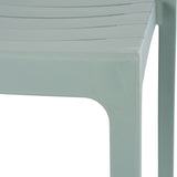 Close-up of the Hill Interiors Moulded Accent Chair in grey, showing the smooth plastic shell edge and curved leg against a plain white background.