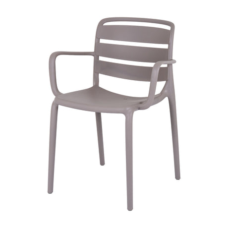Hill Interiors Stone Carver Accent Chair in beige moulded plastic with slatted backrest, curved arms and slim tapered legs on a white background.