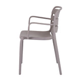 Side view of Hill Interiors Stone Carver beige plastic accent chair with slatted back, curved arms and matte finish on a white background.