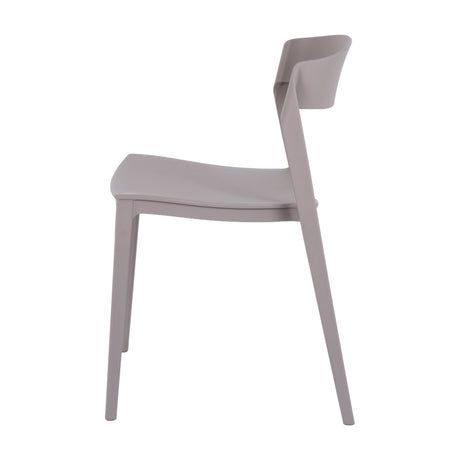 Side view of Hill Interiors Stone-Effect Moulded Accent Chair in beige plastic, showing curved low back and contoured seat on a plain white background.