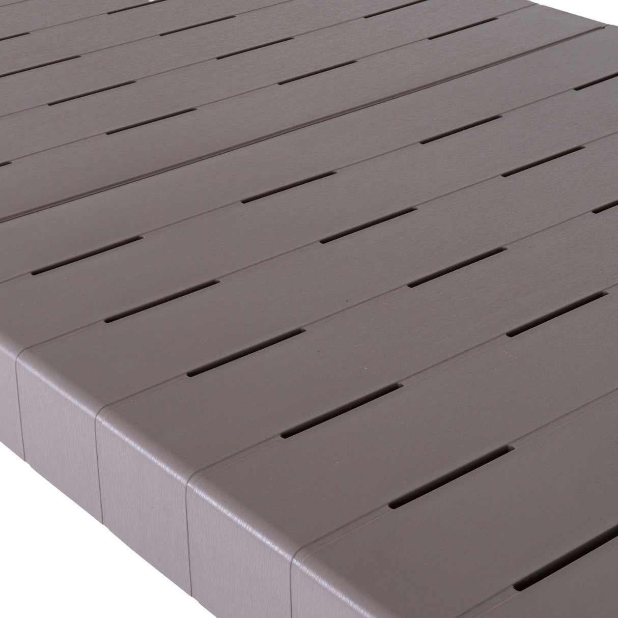 Close-up of the Hill Interiors Stone-Effect Side Table in beige, showing the slatted moulded plastic top and rounded edge against a white background.