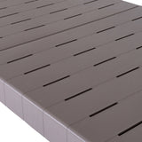Close-up of the Hill Interiors Stone-Effect Side Table in beige, showing the slatted moulded plastic top and rounded edge against a white background.